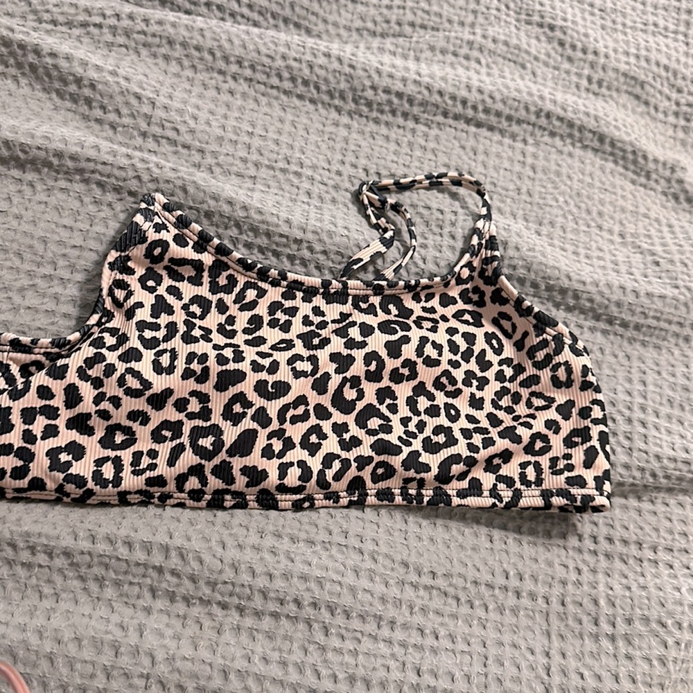 A cheetah print top, very covering, no padding